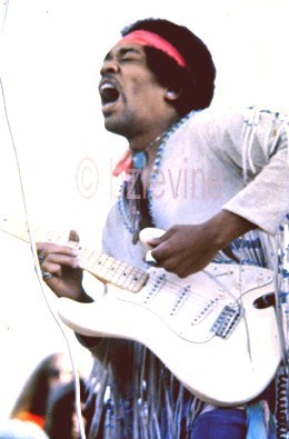 Jimi Hendrix closes the Woodstock Festival